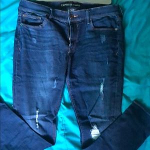 Dark blue ripped jeans